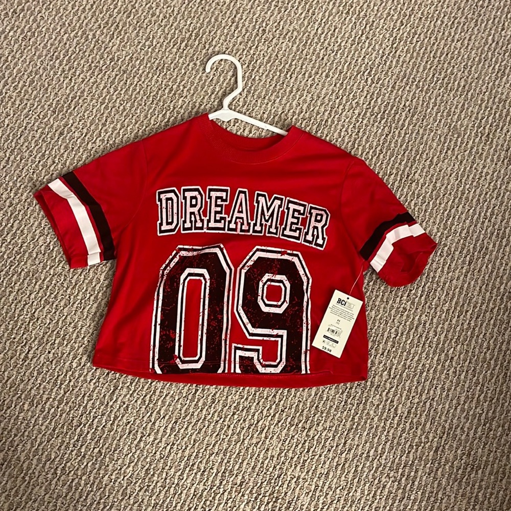 red “dreamer” shirt